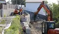 Recta final das obras de canalización e pavimentación no Outeiro, en Lérez, para poñer fin aos asolagamentos