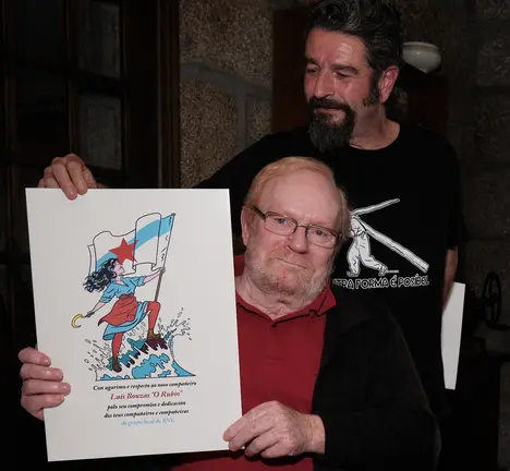 'O Rubio' xunto co ilustrador Victor Rivas nun xantar do BNG no que se agasallou unha l&aacute;mina de Victor Rivas en reco&ntilde;ecemento a toda a s&uacute;a traxectoria